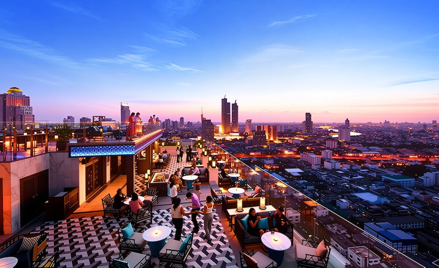 Cocktail su un tavolo con vista panoramica sui grattacieli illuminati di Bangkok di notte